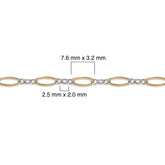 Close-up of a gold filled and silver chain with measurements on a white background